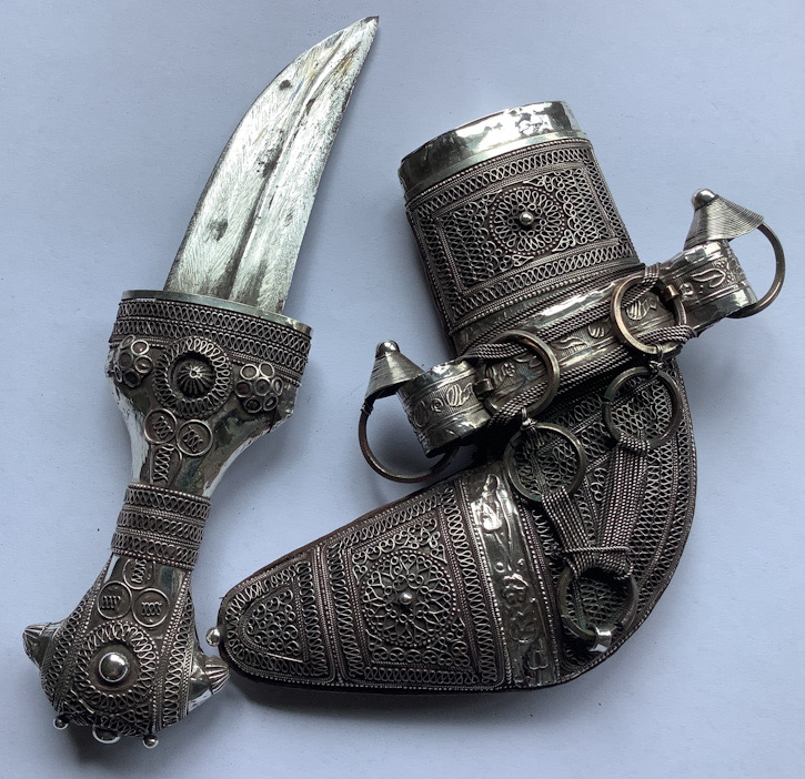 Ornate filigree silver and camel skin dagger from Oman